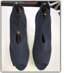 Blue High Heels with zipper back. Brand New.